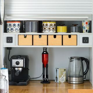kitchen room with coffee maker and kettle