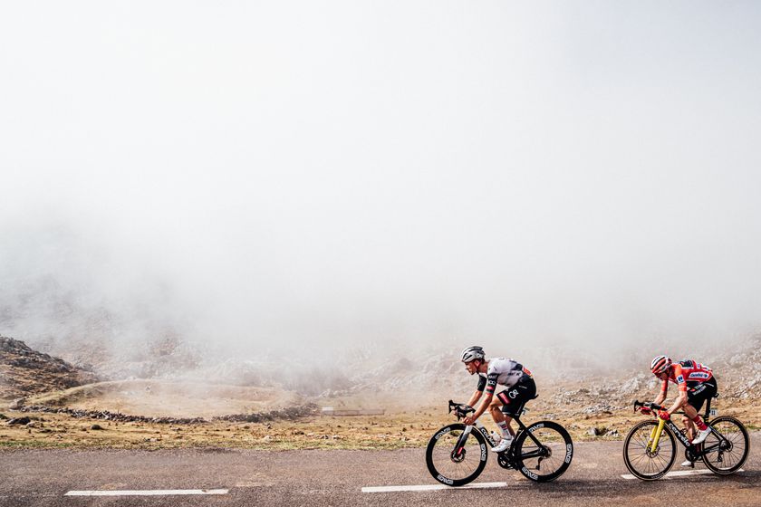 Picture by Zac Williams/SWpix.com - 05/09/2025 - Cycling - 2025 Vuelta Ciclista a Espana Stage 13, Cabezon de la Sal to L&#039;Angliru, Spain - Joao Almedia, UAE Team Emirates XRG, Jonas Vingegaard, Visma Lease a Bike.