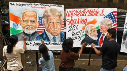 Children in India draw posters about U.S.-India relations under President Donald Trump