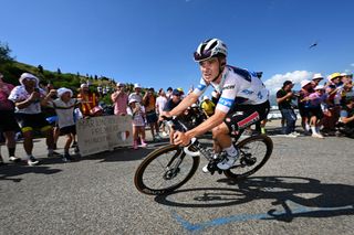 PLATEAU DE BEILLE FRANCE JULY 14 Remco Evenepoel of Belgium and Team Soudal QuickStep White Best Young Rider Jersey competes during the 111th Tour de France 2024 Stage 15 a 1977km stage from Loudenvielle to Plateau de Beille 1782m UCIWT on July 14 2024 in Plateau de Beille France Photo by Tim de WaeleGetty Images