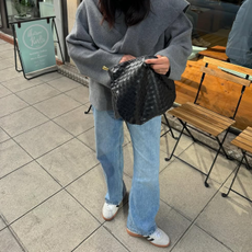 An influencer wearing adidas sneakers. 