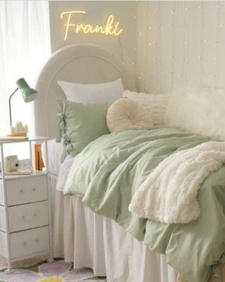 A green and white dorm room