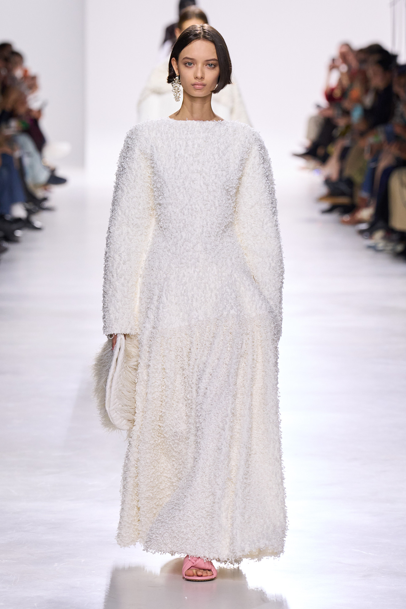 Model wears texture on the Bottega Veneta runway.