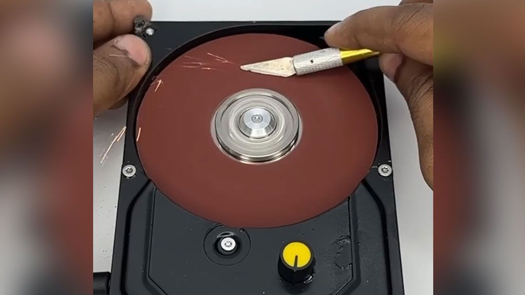 Old hard drive modded into a variable speed disc sander, spinning rust sands things nicely