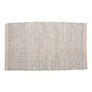 Natural woven bath mat