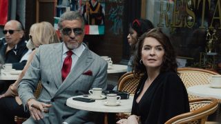 Dwight and Joanne at outdoor restaurant table in Tulsa King Season 3