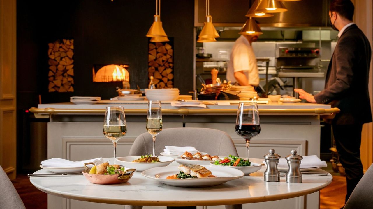 The open kitchen in the sleek dining room