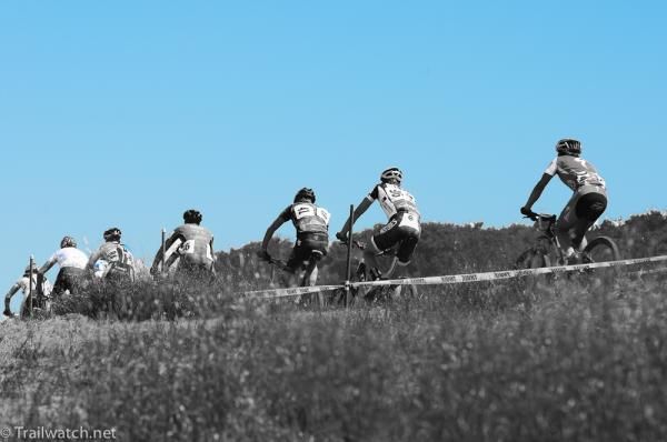 Riders head up the course in an orderly procession