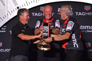 Jim Ochowicz, Jean-Claude Biver and Andy Rhis ring the bell on the new partnership