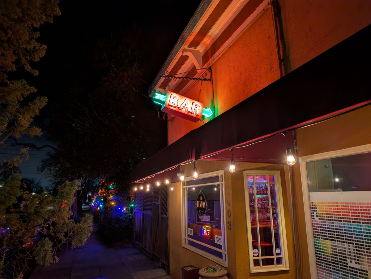 Bar sign at night shot by Pixel 8a