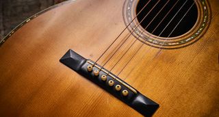 1928 Martin 00-42: this small-bodied acoustic is in perfect playing condition and is an excellent example of pre-war Martin.