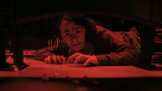 Lilly horrified on theater floor in IT: Welcome to Derry