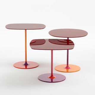 Three tables by Piero Lissoni for Kartell in red, orange and purple