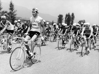 Belgian cyclist Eddy Merckx sits up on his cycle and takes it easy as he leads the pack during the eighth lap of the Tour de France 1969 This would be the first of five victories for Merckx at the Tour de France Photo by Agence France PresseGetty Images