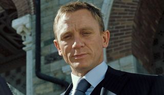Daniel Craig smirks at his off screen target in Casino Royale.