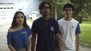 Caitlyn, Zac, and Marcel looking concerned in Motorheads.