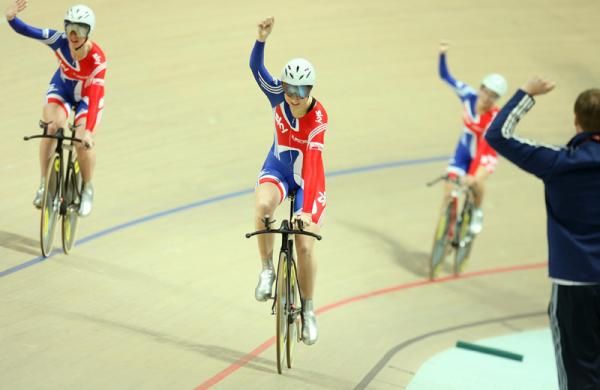 Joanna Rowsell leads the British team celebrations as they win the gold medal in the women's team pursuit