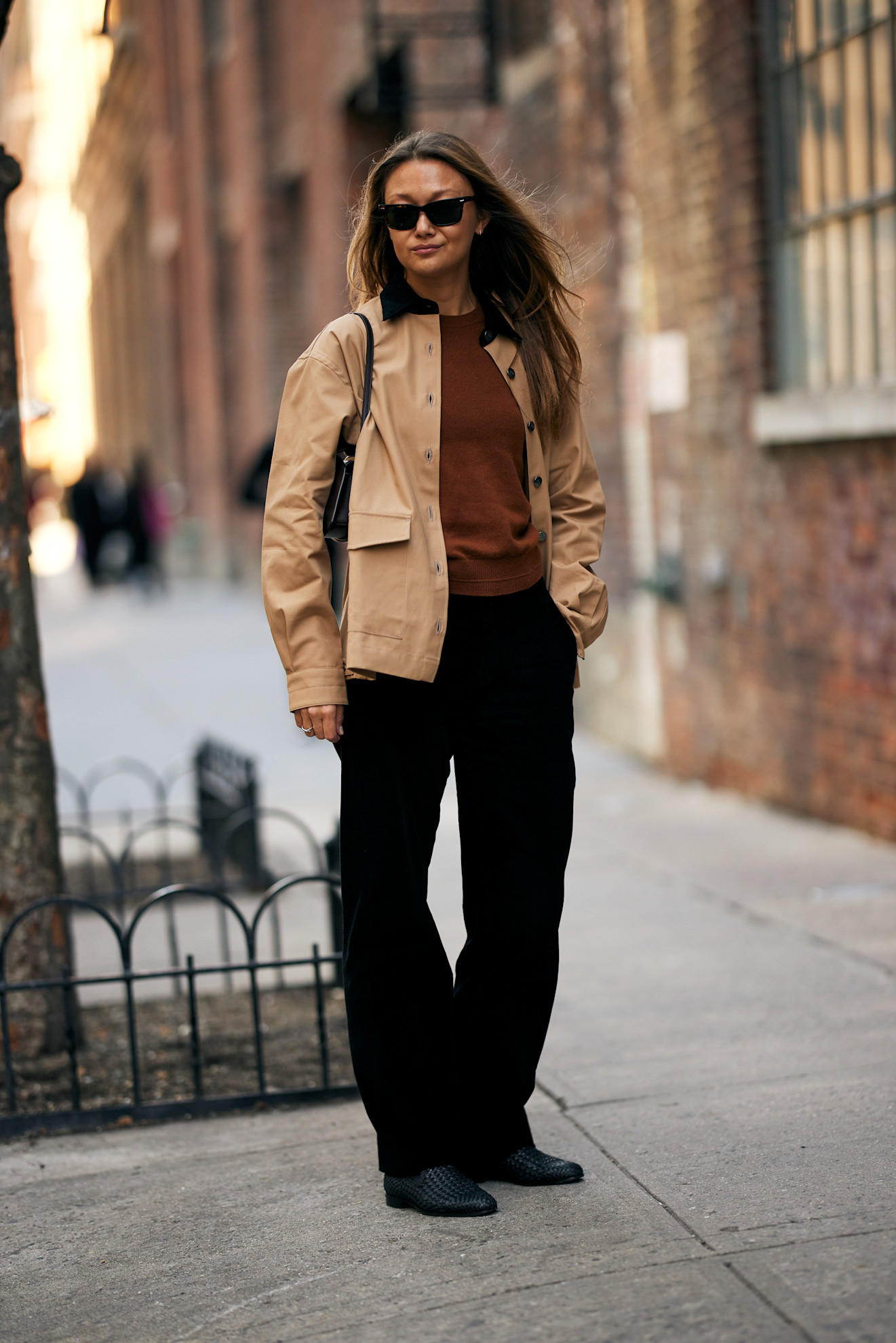 Woman in a tan jacket in New York