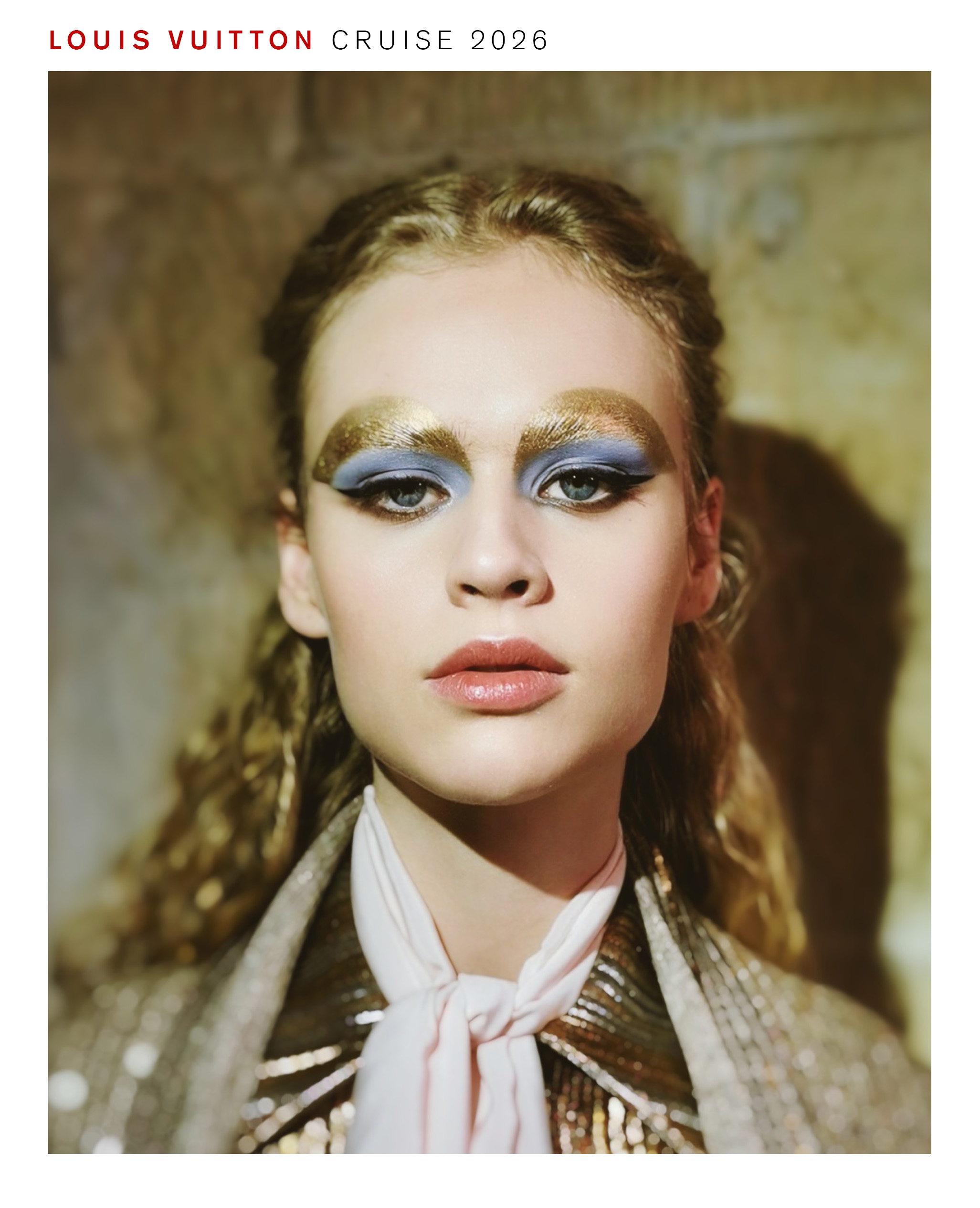 Model wearing Pat McGrath makeup look for Louis Vuitton cruise 2026 show.