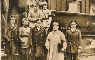 WWI: The Final Hours - Photograph taken 11 November 1918 as Marshal Foche, second from right, leaves the railway carriage in which the Armistice which