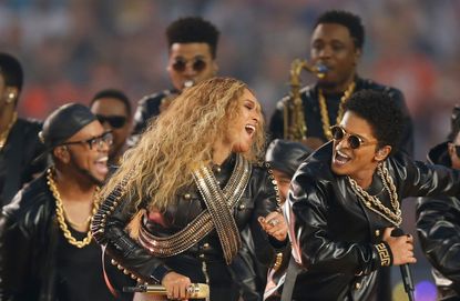Beyonce and Bruno Mars perform during the Pepsi Super Bowl 50 Halftime Show at Levi's Stadium on February 7, 2016 in Santa Clara, California