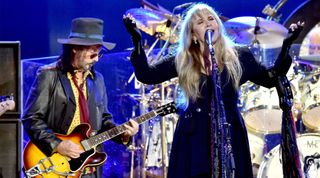 Mike Campbell (L) and Stevie Nicks of Fleetwood Mac perform onstage during the 2018 iHeartRadio Music Festival at T-Mobile Arena on September 21, 2018 in Las Vegas, Nevada. 