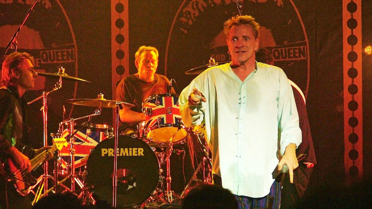 Glen Matlock, Paul Cook and Johnny Rotten (aka John Lydon) of The Sex Pistols perform on stage