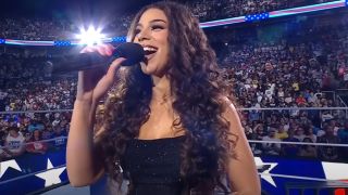 Samantha Irvin singing the national anthem at Money In The Bank 2024