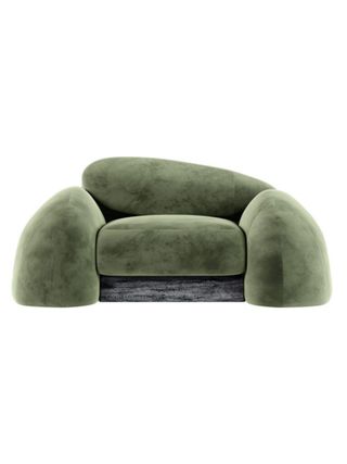 A green velvety love seat sofa with an amusing, whimsical silhouette.