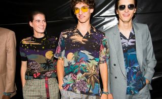 3 male models wearing tropical night printed shirts