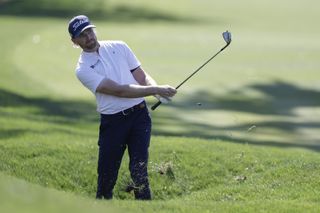 Danny Walker plays a wedge shot during the 2025 Players Championship