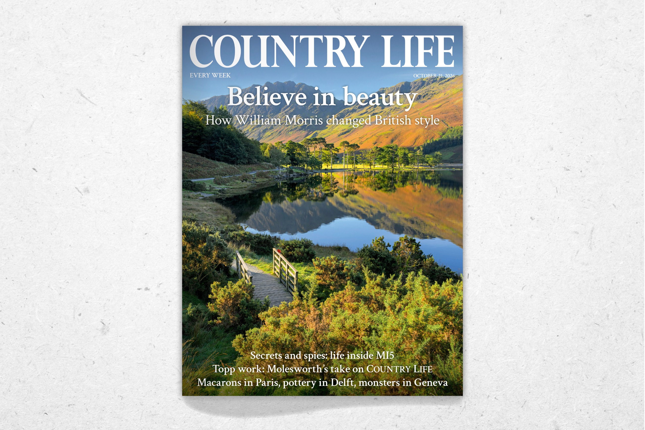 Cover of Country Life October 21, 2026, looks at life inside MI5, pottery, and the beautiful legacy of William Morris. Pictured on the cover is Buttermere in the Lake District photographed by Daniel Kay/Getty.