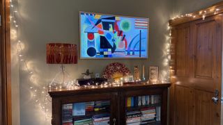 The Frame TV showing art in a front room.