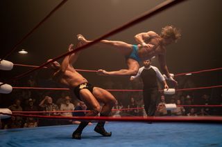 Zac Efron as Kevin von Erich, throws a dropkick in The Iron Claw