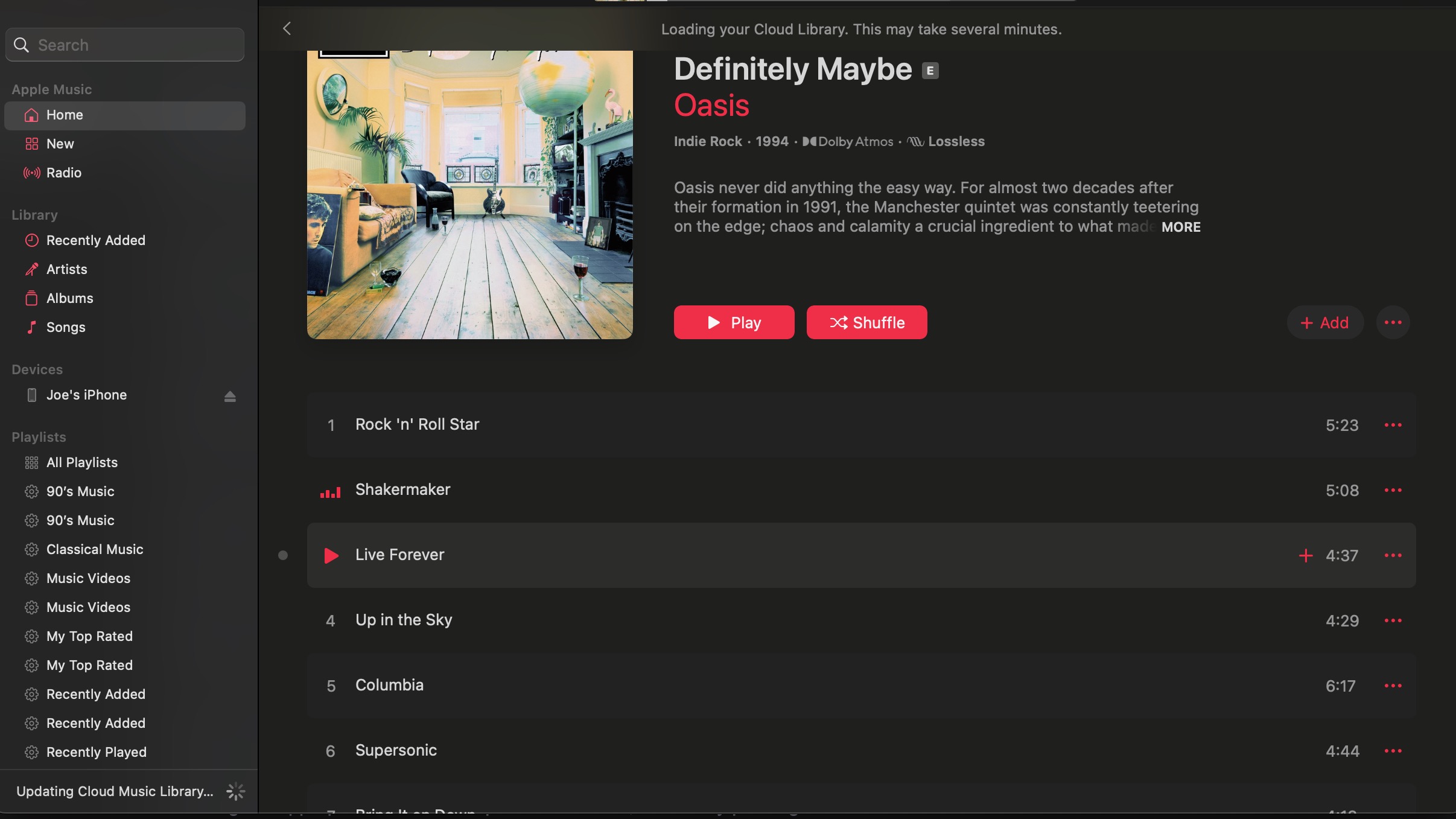 A screenshot of the Oasis album Definitely Maybe playing on the Apple Music desktop app.