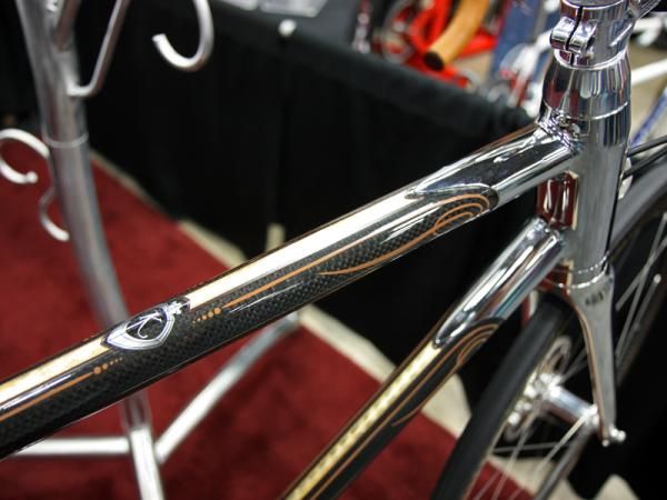Tasteful paint work adds a bit of flair to the Krencker frame without overwhelming the carbon weave.