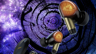 JVC Kenwood WOOD Master earbuds on a colored image of what appears to be a tree section