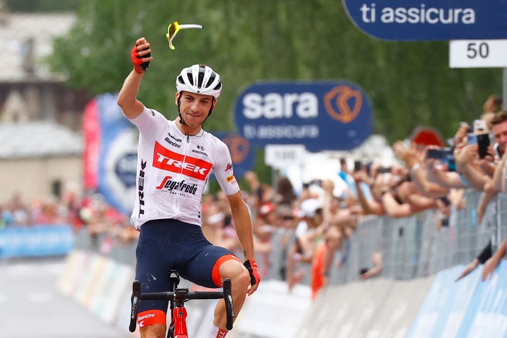 Team Treks Italian rider Giulio Ciccone throws his glasses to the public as he celebrates while crossing the finish line to win the 15th stage of the Giro dItalia 2022 cycling race 177 kilometers from Rivarolo Canavese Piedmont to Cogne Aosta Valley on May 22 2022 Photo by Luca Bettini AFP Photo by LUCA BETTINIAFP via Getty Images