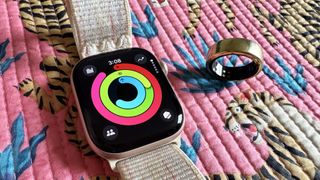 a photo of the Apple Watch 10 and the Oura Ring Generation 3