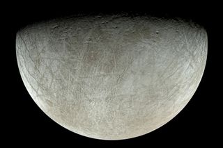 a gray moon surface covered in long striations, against a black background.