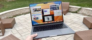 MacBook Pro 14-inch 2023 in hand