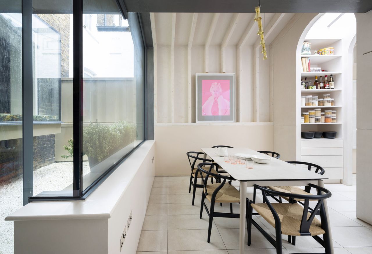 A modern dining room with an internal courtyard