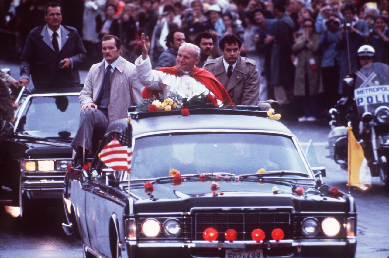 Pope John Paul II waves to the crowd in 1979.