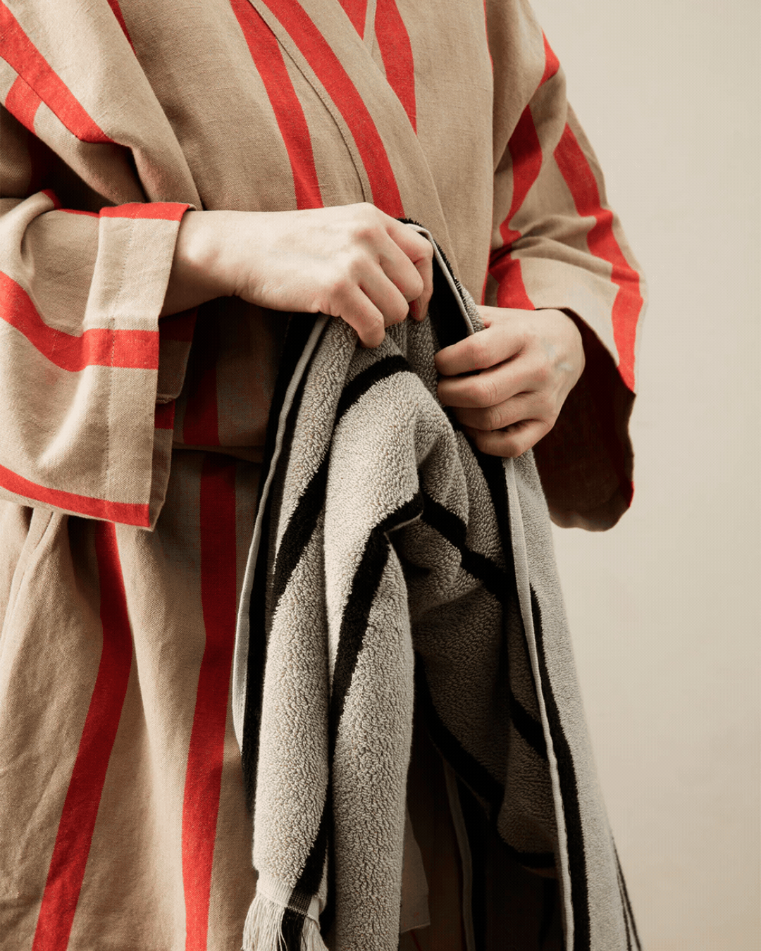 Field Robe in Camel and Red in a rotating gif.
