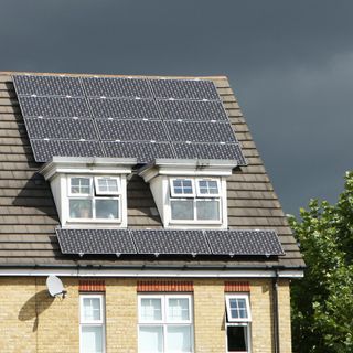 solar panels on roof of house providing electricity