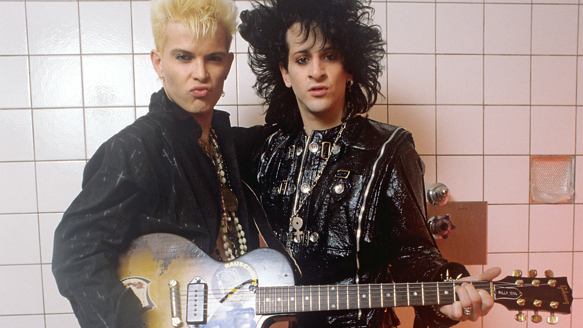 Billy Idol and Steve Stevens pose with Idol's 1957 tobacco sunburst Les Paul Junior, in Dortmund, Germany, October 31, 1984