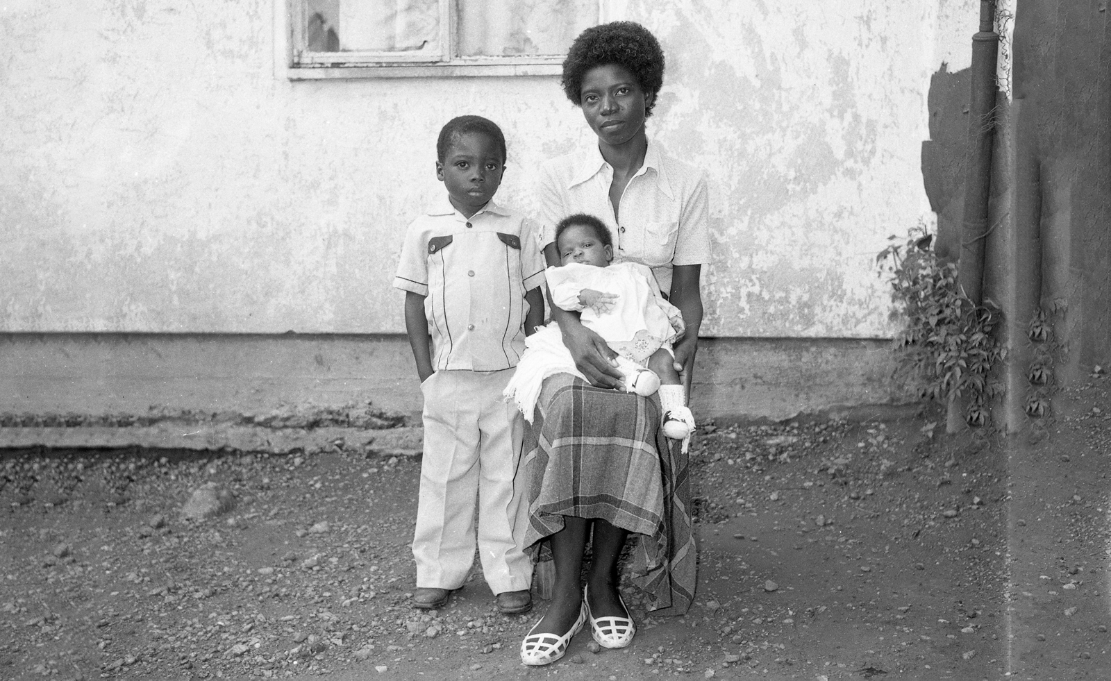 black and white images of people posing for camera