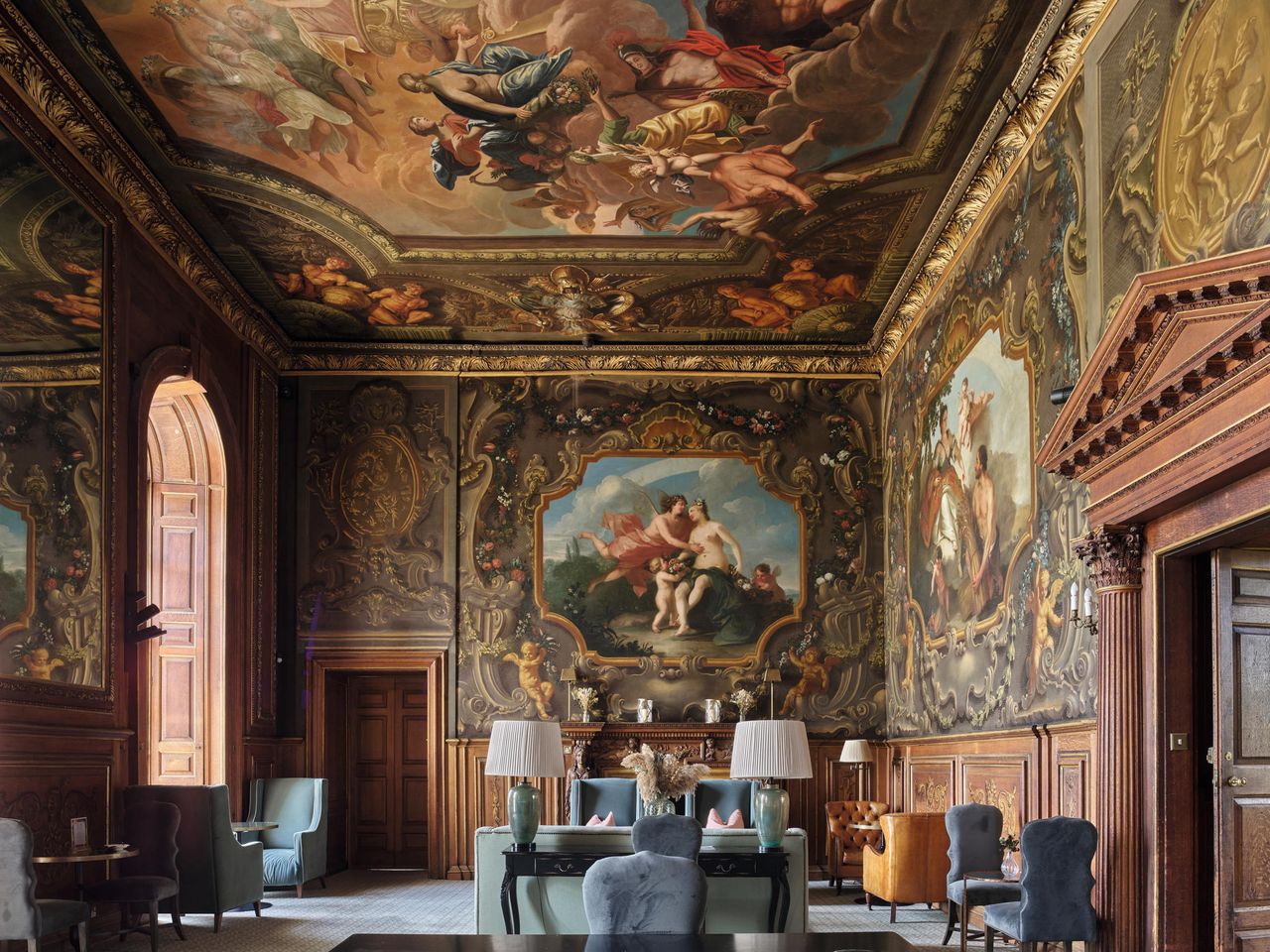 Fig 1: Antonio Verrio’s ceiling, a survival from the Duke of Monmouth’s house, sets the tone for mythological paintings by Francesco Sleter on the Saloon walls. ©Paul Highnam for Country Life