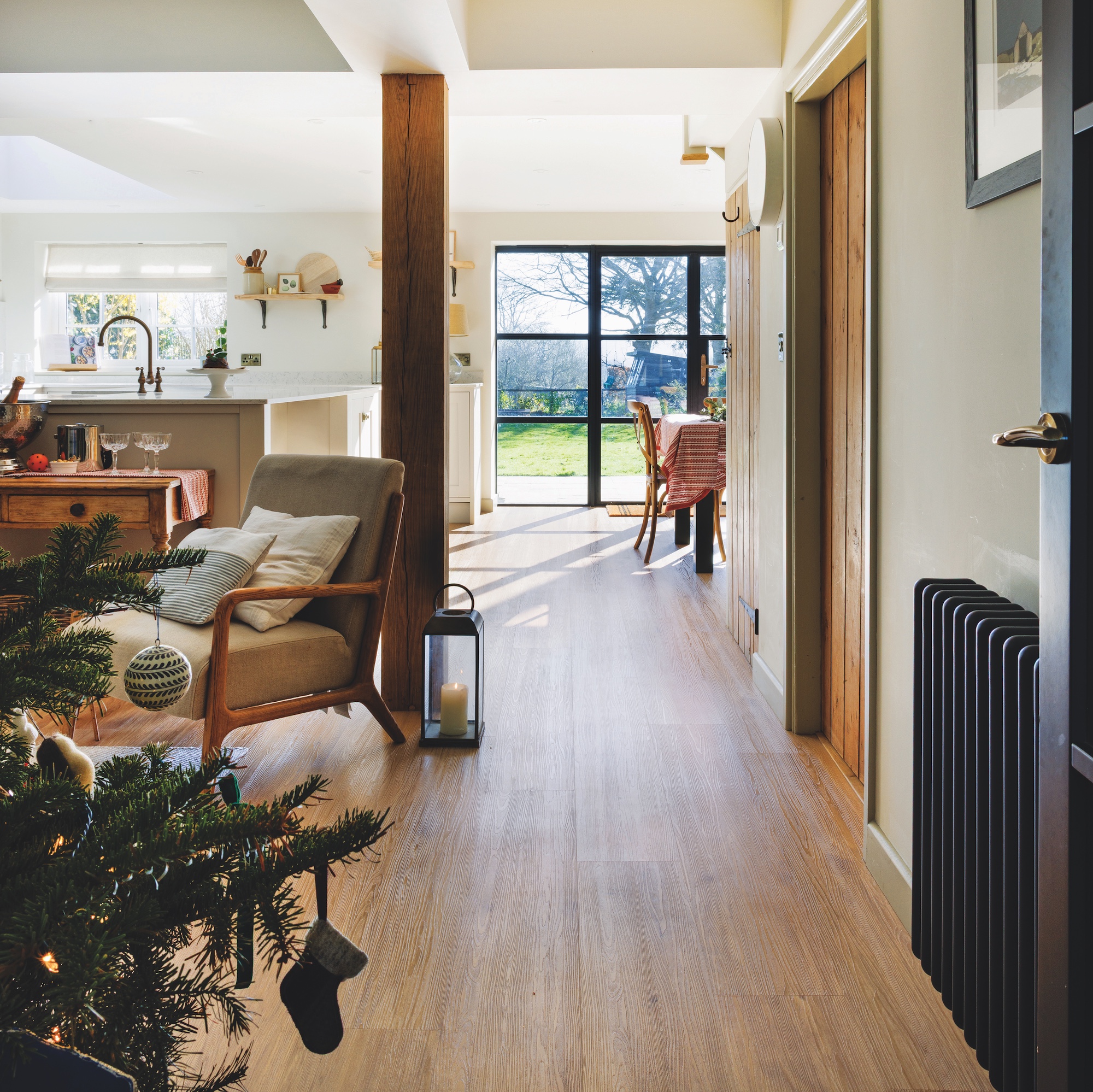 kitchen extension with glazed doors at rear with open plan living room, diner and kitchen
