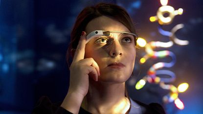 TO GO WITH AFP STORY BY PASCALE MOLLARD-CHENEBENOITA woman wears Google glass as she visits an exhibition dedicated to the work of French artist Niki de Saint Phalle at the Grand Palais in Pa